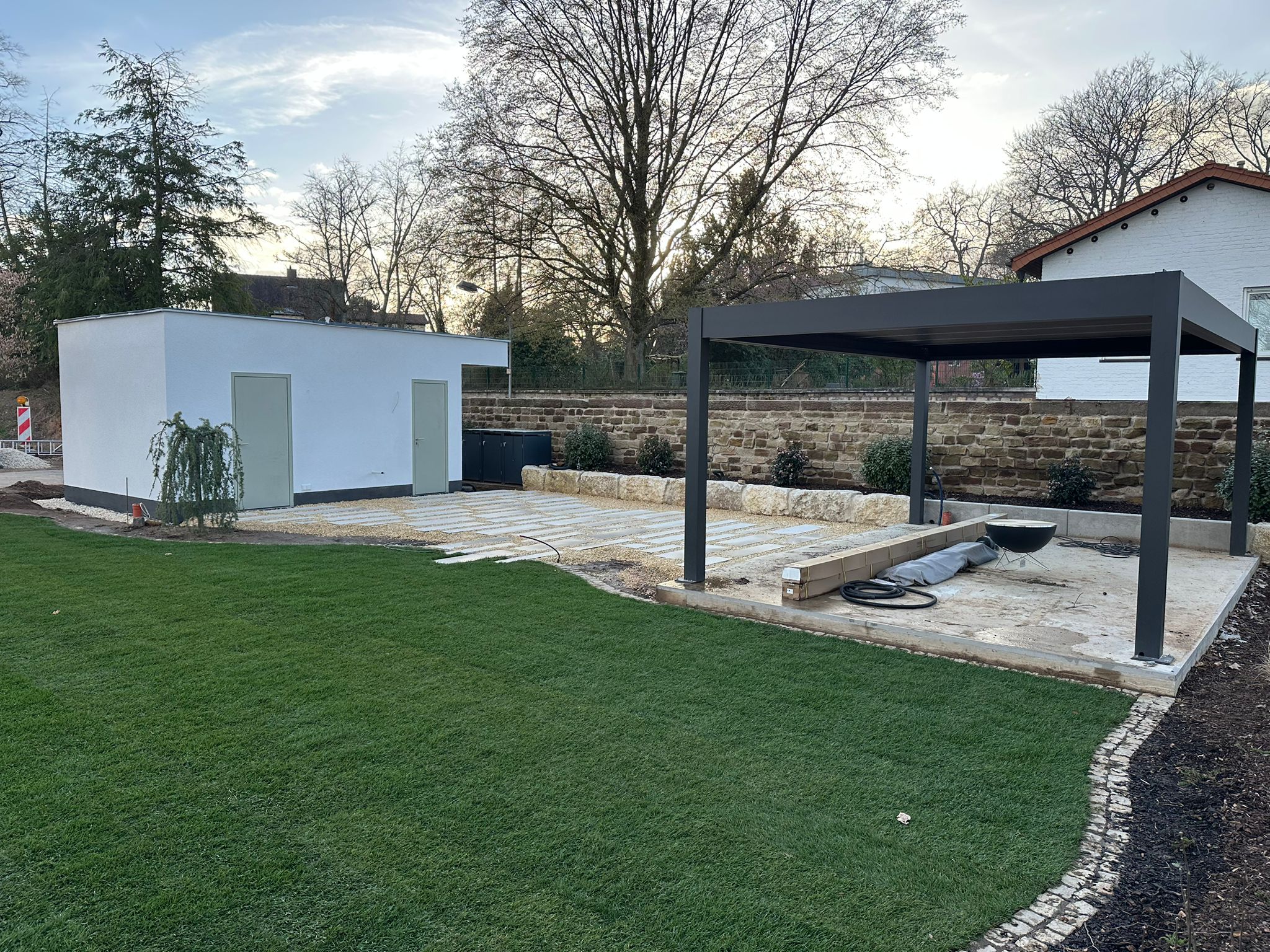 Über Saluto Gartenbau - Team bei der Arbeit